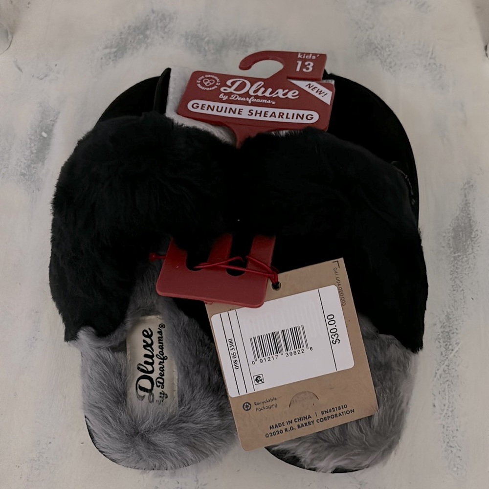 Dluxe by Dearfoams. Kids size 13. NWT. Never worn. Slip ons.